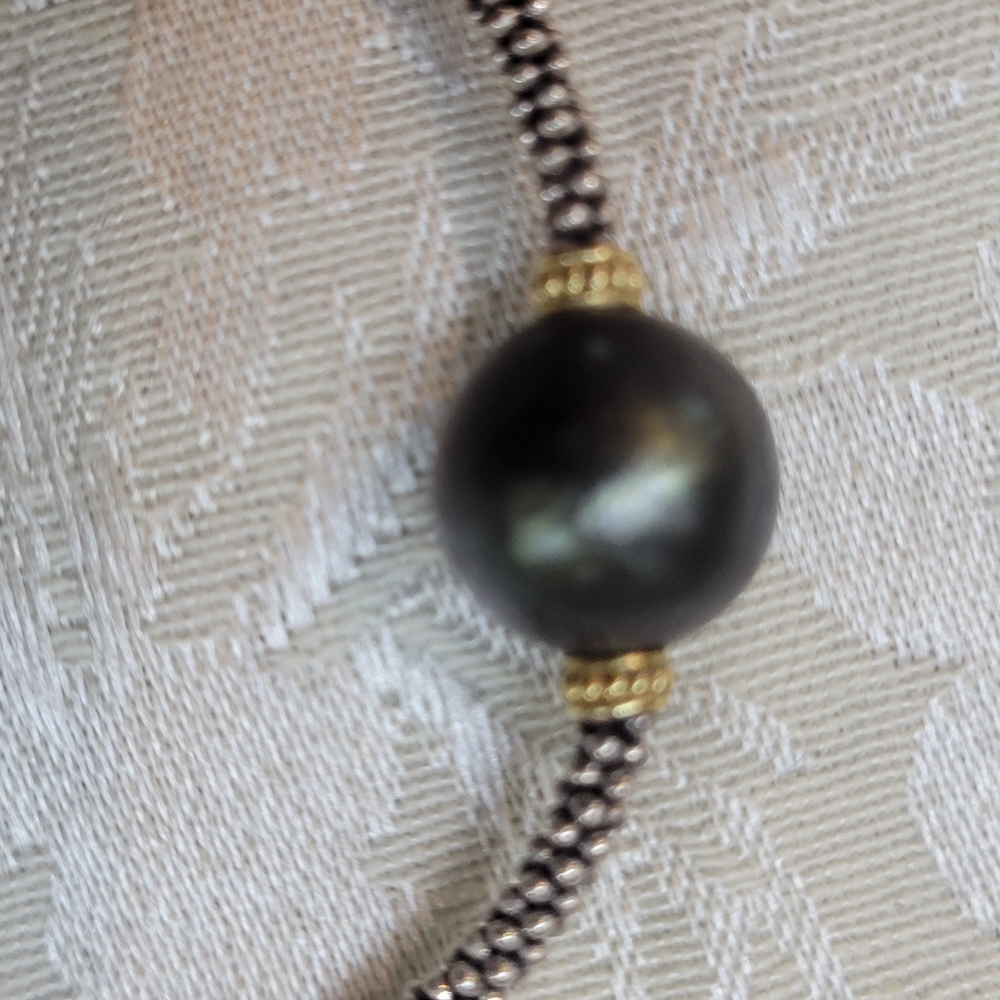 Lagos bracelet with black pearl.